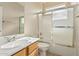 Bathroom with white sink vanity and shower and bathtub combination at 4336 W Hackamore Dr, Phoenix, AZ 85083