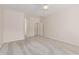 Bright bedroom with neutral carpet and ceiling fan, with access to the hallway and walk-in closet at 4336 W Hackamore Dr, Phoenix, AZ 85083