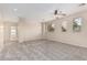 Bright bedroom featuring neutral tones, three windows with lovely natural light and a ceiling fan at 4336 W Hackamore Dr, Phoenix, AZ 85083