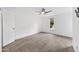 Neutral bedroom features large window, ceiling fan and tiled flooring at 4354 N 82Nd St # 167, Scottsdale, AZ 85251
