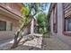 Exterior courtyard between condo buildings with xeriscaping at 4354 N 82Nd St # 167, Scottsdale, AZ 85251