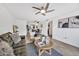 Airy living room with tile floors, ceiling fan and views into the dining area at 4354 N 82Nd St # 167, Scottsdale, AZ 85251