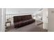 Lofted space featuring a futon and banister overlooking the living area and decorated with plates at 441 S Maple -- # 83, Mesa, AZ 85206