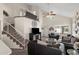 Bright living room featuring high ceilings, a staircase, and comfortable seating, perfect for entertaining and relaxation at 441 S Maple -- # 83, Mesa, AZ 85206