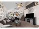 Open-concept layout with a cozy living room that flows into the kitchen, ideal for modern living and entertaining guests at 441 S Maple -- # 83, Mesa, AZ 85206