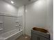 A bathroom featuring a vanity and bathtub with white walls at 47451 W Kenner Dr, Maricopa, AZ 85139