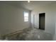 A cozy bedroom featuring a closet and window at 47451 W Kenner Dr, Maricopa, AZ 85139