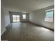 A spacious living room with natural light at 47451 W Kenner Dr, Maricopa, AZ 85139