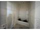 A bathtub with shower head, ready for finishing touches at 47719 W Kenner Dr, Maricopa, AZ 85139