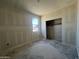Bedroom with a closet and window offering views at 47719 W Kenner Dr, Maricopa, AZ 85139