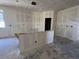 Bright kitchen space, awaiting finishing touches at 47719 W Kenner Dr, Maricopa, AZ 85139