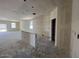 Spacious living area with windows for natural light and flexible design options at 47719 W Kenner Dr, Maricopa, AZ 85139