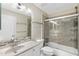 Bathroom featuring a vanity with mosaic tile backsplash, a tub, and a shower with glass doors at 4901 E Kelton Ln # 1052, Scottsdale, AZ 85254