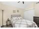 Bedroom featuring a large window, vaulted ceiling, and neutral decor at 4901 E Kelton Ln # 1052, Scottsdale, AZ 85254