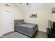 Cozy bedroom with vaulted ceilings, wood floors and a comfortable queen size bed at 4901 E Kelton Ln # 1052, Scottsdale, AZ 85254