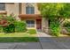 Charming townhome with a beautiful yard, lush greenery, and lots of curb appeal at 4901 E Kelton Ln # 1052, Scottsdale, AZ 85254