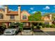 Lovely townhome featuring covered parking, mature landscaping, and a private front entrance at 4901 E Kelton Ln # 1052, Scottsdale, AZ 85254