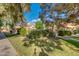 Charming single-story home featuring desert landscaping and a Spanish tile roof, enhancing curb appeal at 4901 E Kelton Ln # 1052, Scottsdale, AZ 85254