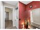 Hallway leading to the laundry closet with stackable washer and dryer at 4901 E Kelton Ln # 1052, Scottsdale, AZ 85254