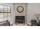 Living room featuring a modern fireplace, mantle, and neutral wall paint at 4901 E Kelton Ln # 1052, Scottsdale, AZ 85254