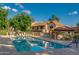 Community pool with lounge chairs and an adjacent gazebo for relaxing at 4901 E Kelton Ln # 1052, Scottsdale, AZ 85254
