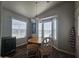 Dining area featuring modern chandelier and large bay window at 650 N Hawes Rd # 3604, Mesa, AZ 85207