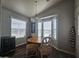 A view of the dining room with a round table and 4 chairs at 650 N Hawes Rd # 3604, Mesa, AZ 85207