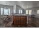 A view of the kitchen with hardwood floors, cabinets, and a fire extinguisher at 650 N Hawes Rd # 3604, Mesa, AZ 85207