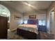 Spacious bedroom features neutral walls, carpet and ceiling fan, creating a calming, comfortable atmosphere at 650 N Hawes Rd # 3604, Mesa, AZ 85207