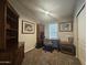 Carpeted office featuring desk, bookcase and a large closet at 650 N Hawes Rd # 3604, Mesa, AZ 85207