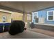 Covered patio featuring a grill and outdoor trash cans at 650 N Hawes Rd # 3604, Mesa, AZ 85207