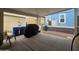 Covered patio featuring a grill and outdoor trash cans at 650 N Hawes Rd # 3604, Mesa, AZ 85207