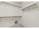 Spacious closet featuring shelving and carpet flooring at 7130 E Laguna Azul Ave, Mesa, AZ 85209