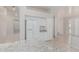 Modern kitchen featuring white cabinets and granite countertops, open to living areas at 7130 E Laguna Azul Ave, Mesa, AZ 85209
