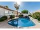 Sparkling pool surrounded by lush greenery, perfect for relaxation and outdoor enjoyment at 7130 E Laguna Azul Ave, Mesa, AZ 85209