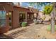 Backyard featuring a brick patio and comfortable seating area at 7413 E Russet Sky Dr, Scottsdale, AZ 85266
