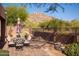 Backyard seating area against a desert mountain backdrop at 7413 E Russet Sky Dr, Scottsdale, AZ 85266