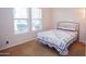 Second bedroom featuring bright windows and comfortable carpeting at 7413 E Russet Sky Dr, Scottsdale, AZ 85266