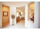 Inviting entryway showcasing neutral tones, decorative columns and archways, enhancing the home's flow at 7413 E Russet Sky Dr, Scottsdale, AZ 85266