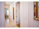 Hallway showcasing tile flooring, neutral walls and views of other rooms at 7413 E Russet Sky Dr, Scottsdale, AZ 85266