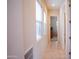 Bright hallway with neutral paint, tile floors and two large windows with blinds at 7413 E Russet Sky Dr, Scottsdale, AZ 85266