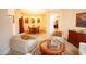 Cozy living room featuring tile and carpet flooring and elegant furnishings at 7413 E Russet Sky Dr, Scottsdale, AZ 85266