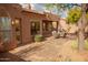 Covered patio with brick pavers and an outdoor dining set for enjoying the weather at 7413 E Russet Sky Dr, Scottsdale, AZ 85266