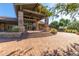 Clubhouse exterior with an inviting entrance, showcasing its architectural details and landscaped surroundings at 7939 E Stonecliff Cir, Mesa, AZ 85207