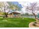 Beautiful green space with a covered picnic area next to the community tennis courts at 7939 E Stonecliff Cir, Mesa, AZ 85207