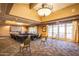 Well-appointed conference room with a large table and presentation screen at 7939 E Stonecliff Cir, Mesa, AZ 85207