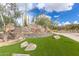 Stone sign with 'Las Sendas Mountain' branding at the community entrance at 7939 E Stonecliff Cir, Mesa, AZ 85207