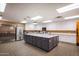 Spacious kitchen featuring a large center island, modern appliances, and ample cabinet space at 7939 E Stonecliff Cir, Mesa, AZ 85207