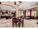 Open-concept living space showcasing a seamless flow between the kitchen and living room, enhanced with stylish furnishings at 7939 E Stonecliff Cir, Mesa, AZ 85207