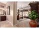 View of the primary bedroom with an ensuite bathroom and closet at 7939 E Stonecliff Cir, Mesa, AZ 85207